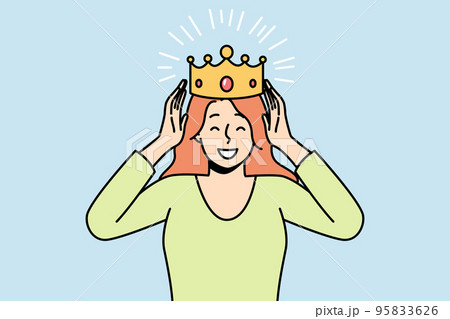 Smiling confident woman with crown on head Smiling confident woman with crown on head 95833626