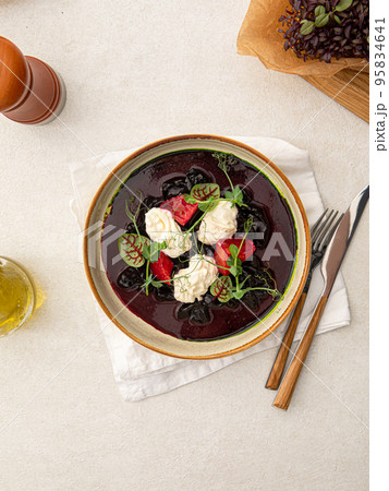 Dried beet salad with stracciatella cheese Dried beet salad with stracciatella cheese 95834641