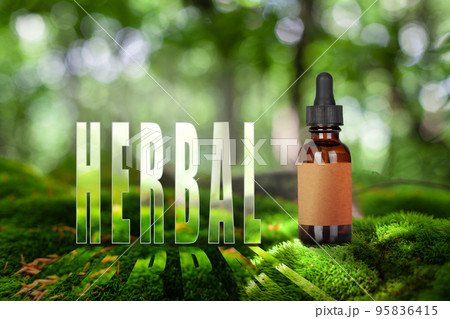Herbal oil on moss, green bokeh background. Mockup, alternative Medicine. Herbal oil on moss, green bokeh background. Mockup, alternative Medicine. 95836415