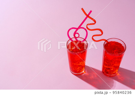 Summer drinks with straws on color background 95840236