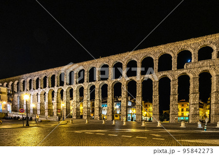 Roman Aqueduct of Segovia at night, one of the best-preserved elevated Roman Aqueducts. Castile and Leon, Spain. Roman Aqueduct of Segovia at night, one of the best-preserved elevated Roman Aqueducts. Castile and Leon, Spain. 95842273