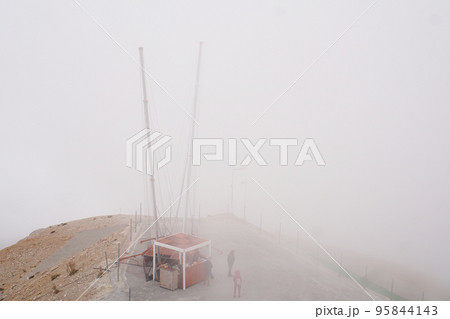 Slingshot attraction on the top of Tahtali mountan with fog sky background Slingshot attraction on the top of Tahtali mountan with fog sky background 95844143