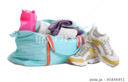 Sports bag with gym equipment on white background 95846951