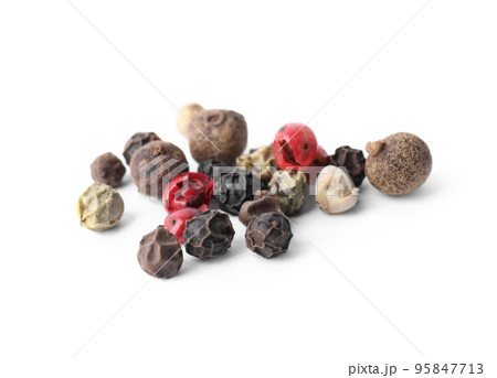 Mix of different pepper grains isolated on white 95847713