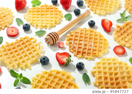 Flat lay with wafer slices on white background Flat lay with wafer slices on white background 95847727