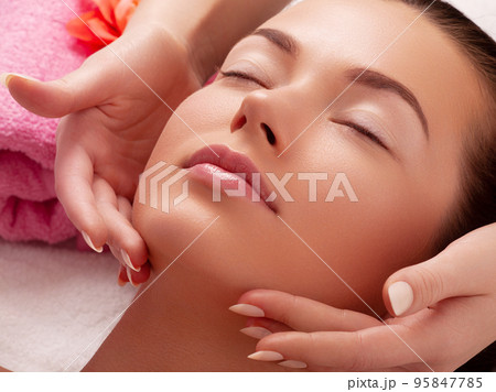Young girl with thick eyebrows and perfect skin at 95847785
