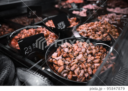 Different seafood on display, closeup. Wholesale market 95847879