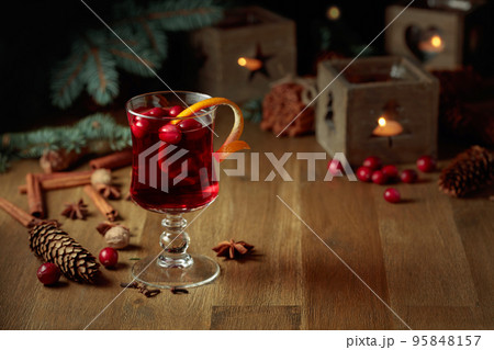 Christmas drink with spices and cranberries. Christmas drink with spices and cranberries. 95848157