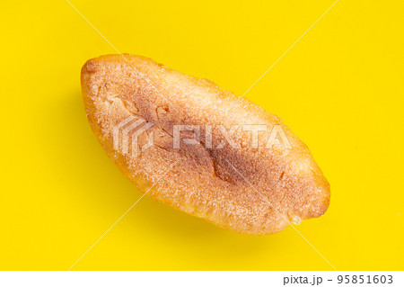 Bread isolated on yellow background 95851603