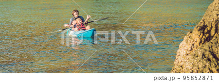 Father and son kayaking at tropical ocean. BANNER, long format 95852871