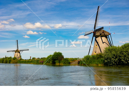 Tranquil view of windmills at Kinderdijk, Netherlands Tranquil view of windmills at Kinderdijk, Netherlands 95855639
