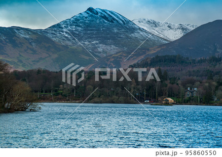 Derwent Waterand and Skiddaw mountain in background. 95860550