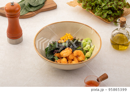 Shrimp poke bowl with vegetables and corn Shrimp poke bowl with vegetables and corn 95865399