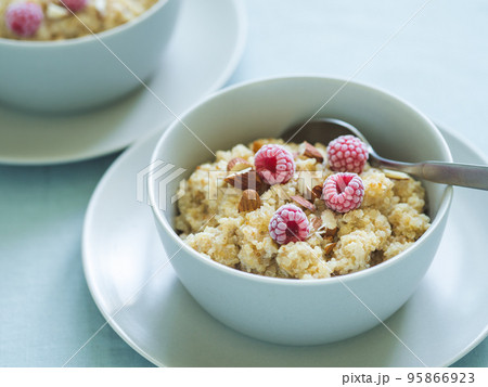 Quinoa porrige with raspberries and almond Quinoa porrige with raspberries and almond 95866923