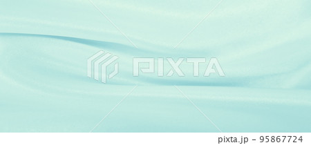 Smooth elegant blue silk or satin luxury cloth texture as abstract background. Luxurious background design Smooth elegant blue silk or satin luxury cloth texture as abstract background. Luxurious background design 95867724