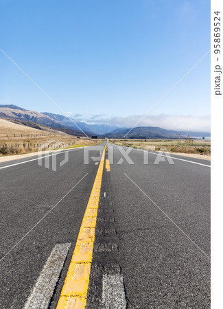 Asphalt road and countryside landscape 95869524