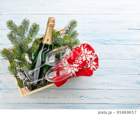 Christmas gift box with champagne bottle 95869657