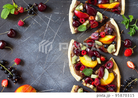Pizza menu. Summer fruit berry pizza with chocolate paste. Vitamin dessert. Top view flat lay background, copy space. 95870315