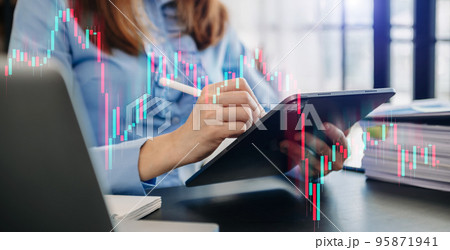 Trading growth graph on business and investment and finance business analysis stockmarket with digital tablet.digital technology background.. Trading growth graph on business and investment and finance business analysis stockmarket with digital tablet.digital technology background.. 95871941