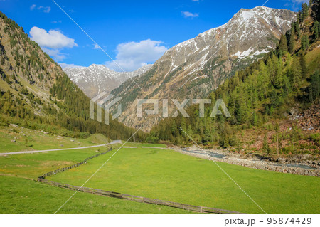 Alpine meadows in Stubai Valley and river, North Tyrol, Austria 95874429