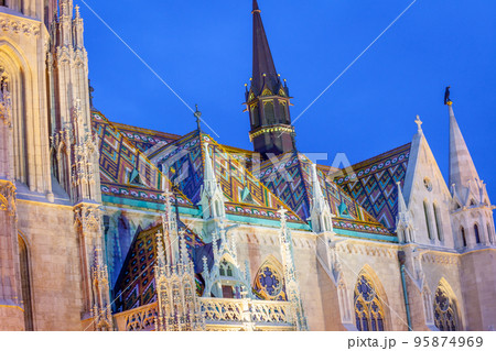 St. Matthias neogothical cathedral illuminated at night in Budapest. Hungary St. Matthias neogothical cathedral illuminated at night in Budapest. Hungary 95874969
