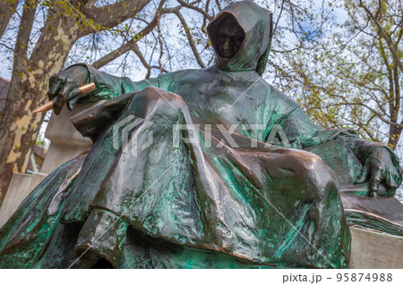 Statue of Anonymous, Notary of King Bela in the Vajdahunyad, Budapest, Hungary 95874988