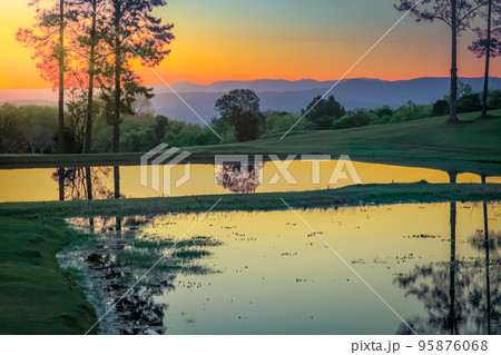 Southern Brazil countryside and lake landscape at peaceful sunset Southern Brazil countryside and lake landscape at peaceful sunset 95876068