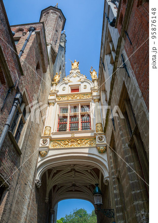 facade on historic Justice Palace from low angle, Bruges, Belgium facade on historic Justice Palace from low angle, Bruges, Belgium 95876148