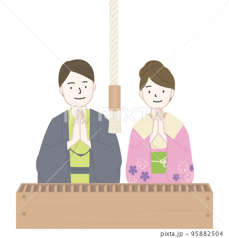 神社にお参りをする着物姿の男女 95882504