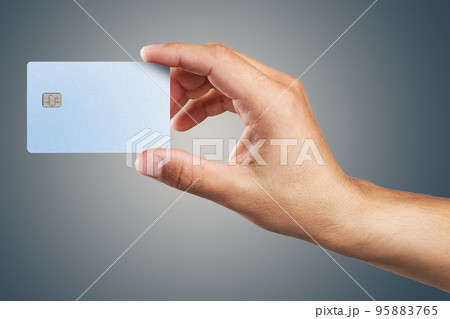 Man's hand holding credit card. Man's hand holding credit card. 95883765