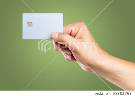 Man's hand holding credit card. 95883768