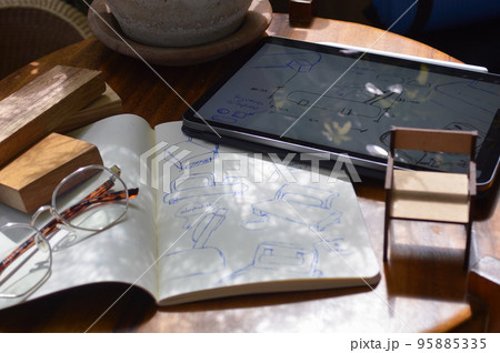furniture design, digital drawing in tablet and analog in notebook 95885335