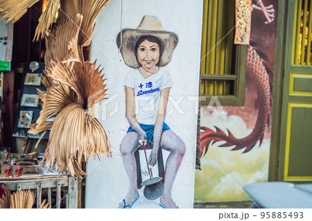 PENANG, MALAYSIA - APRIL 20, 2018: Street art of colonial city Georgetown 95885493