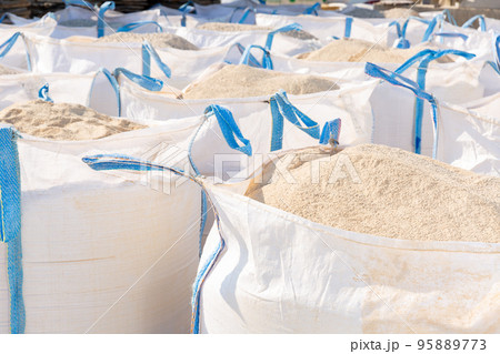 Bags of building mix at hardware store warehouse Bags of building mix at hardware store warehouse 95889773