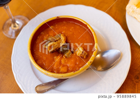 Just cooked patatas revolconas served on table 95889845