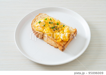 bread toast with scramble egg bread toast with scramble egg 95896009