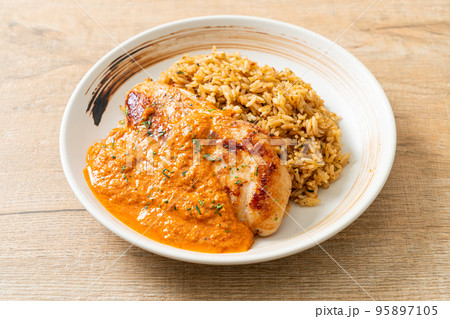 grilled chicken steak with red curry sauce and rice 95897105