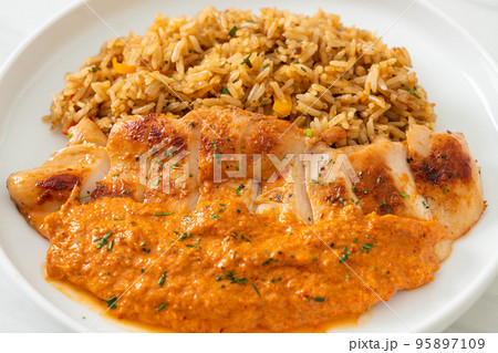 grilled chicken steak with red curry sauce and rice grilled chicken steak with red curry sauce and rice 95897109