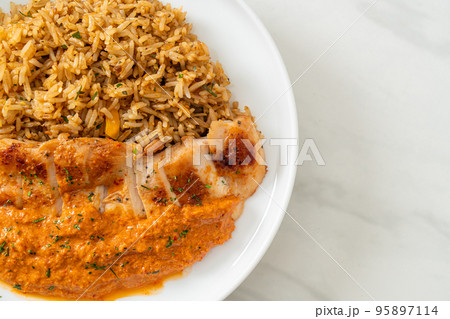 grilled chicken steak with red curry sauce and rice grilled chicken steak with red curry sauce and rice 95897114