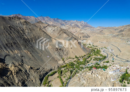 Aerial view of Lamayuru village and Lamayuru Monastery or Gompa is a tibetan style buddhist monastery in Ladakh, north India Aerial view of Lamayuru village and Lamayuru Monastery or Gompa is a tibetan style buddhist monastery in Ladakh, north India 95897673