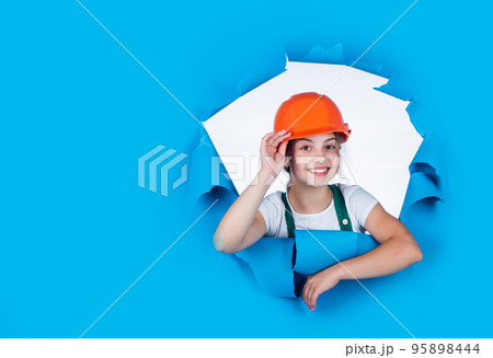 happy kid engineer in hard hat, copy space, profession 95898444