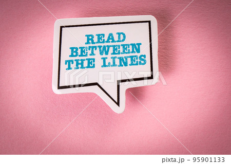 Read Between The Lines. Speech bubble with text on pink background 95901133