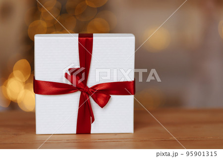 New Year or Christmas Gift Box with Red Ribbon. New Year or Christmas Gift Box with Red Ribbon. 95901315