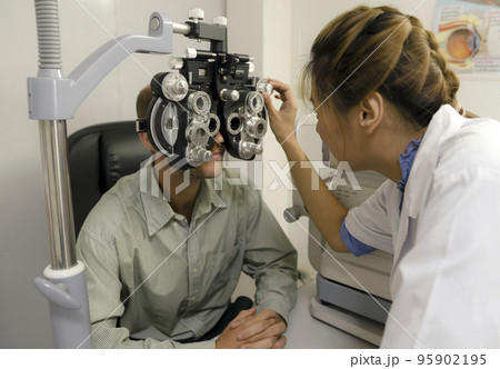 Eye exam, ophthalmologist, eye health. Eye exam, ophthalmologist, eye health. 95902195