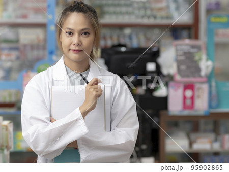 Asian female pharmacist, drug consultant. Asian female pharmacist, drug consultant. 95902865