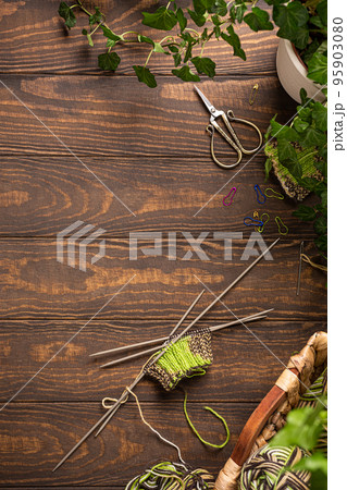 Female hobby knitting. Knitting project in progress 95903080