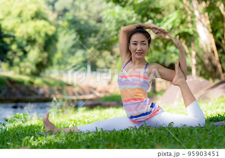 Woman doing yoga exercises. 95903451