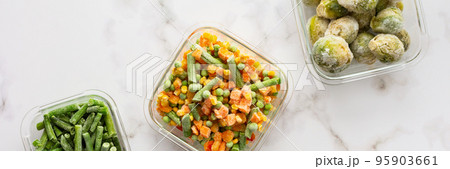Frozen vegetables in containers Frozen vegetables in containers 95903661