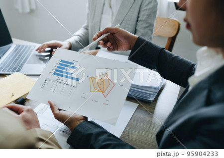 Asian entrepreneurs and business people meeting in a conference room in business planning, financial budget and investment risk assessment to analyze customer groups to increase company growth. 95904233