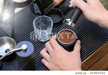 Barista making slow bar coffee. Barista making slow bar coffee. 95904582